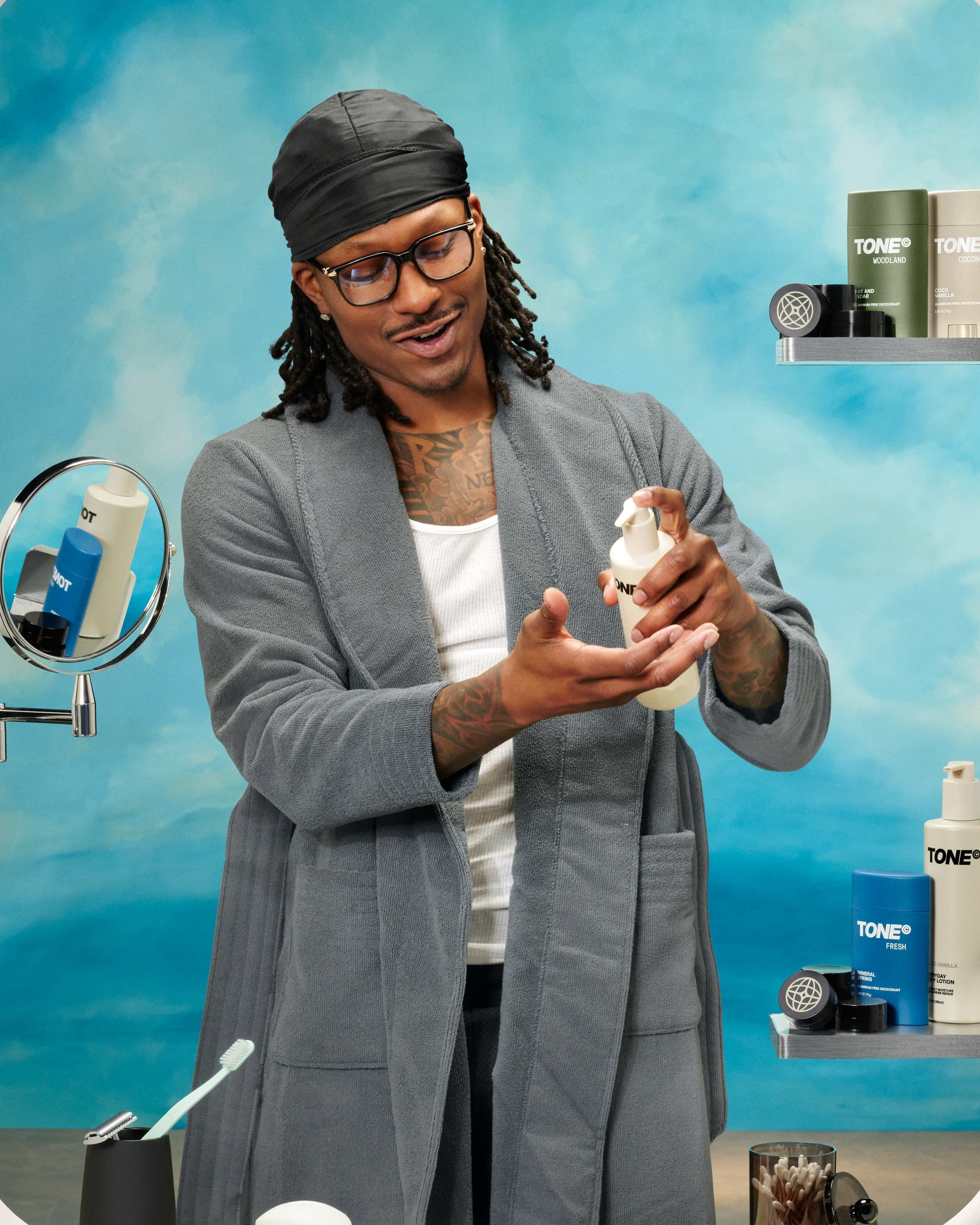 Duke Dennis using TONE Body Lotion