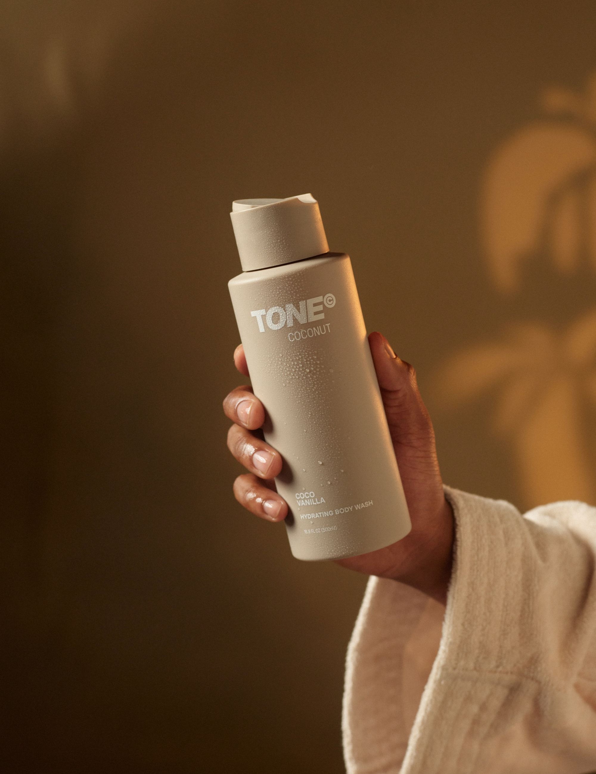 Hand Holding TONE Coco Vanilla Body Wash