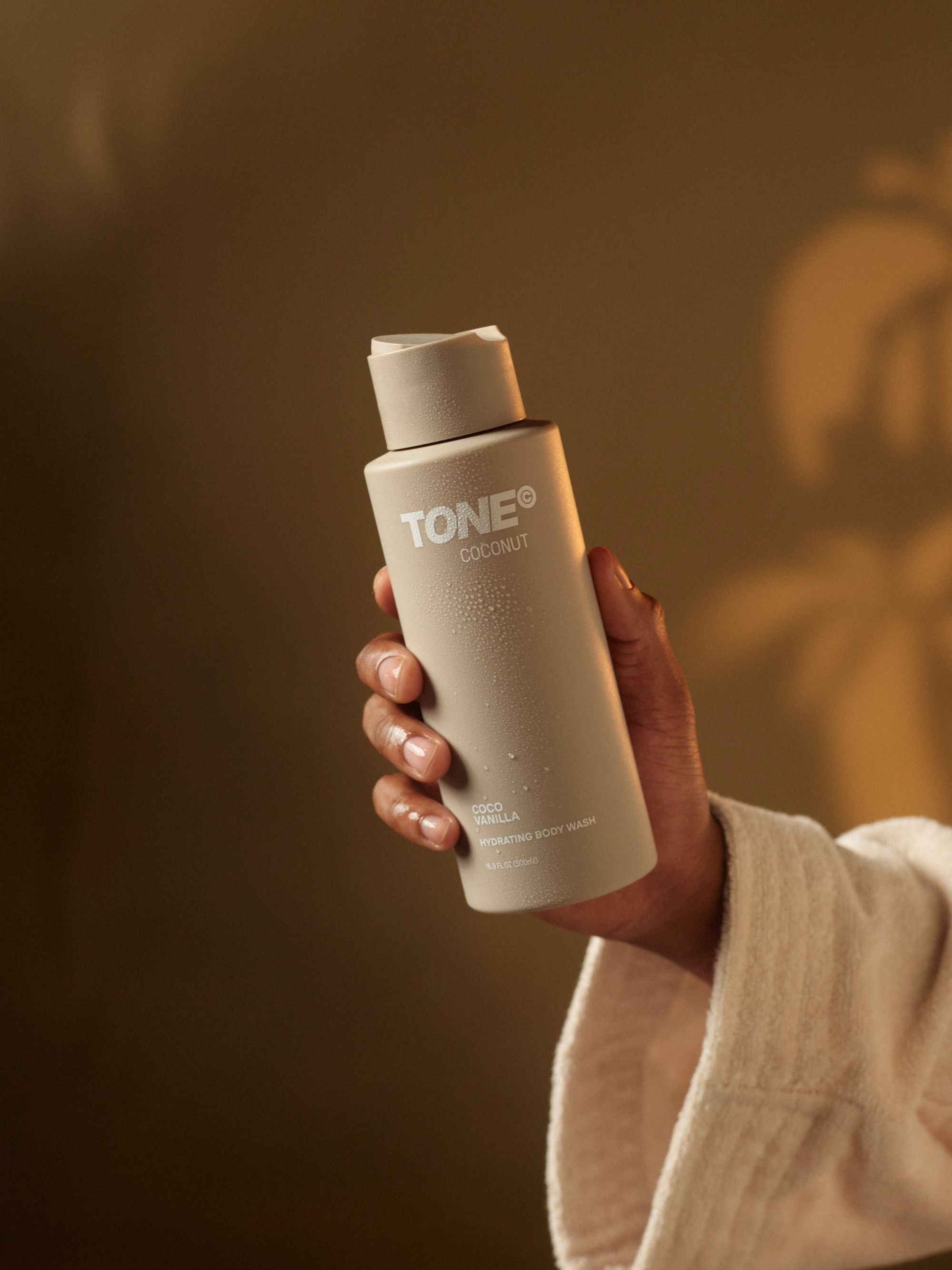 Hand Holding TONE Coco Vanilla Body Wash