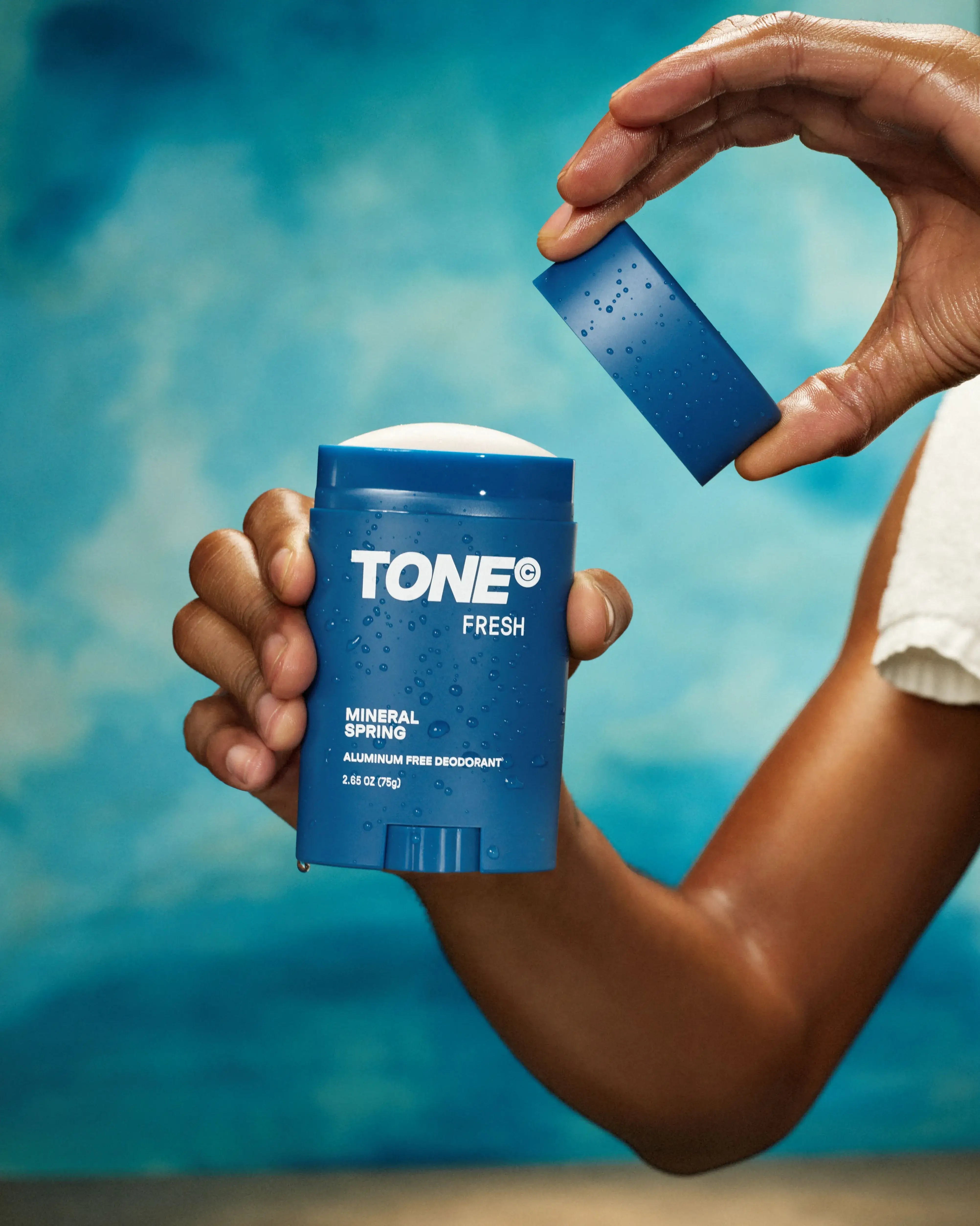 Man Opening TONE Fresh Aluminum-Free Deodorant